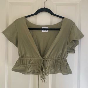 green crop top